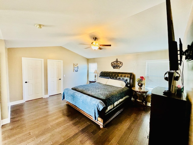 bedroom featuring lofted ceiling, hardwood / wood-style flooring, and ceiling fan