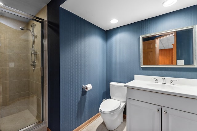 bathroom featuring a shower with door, tile patterned floors, vanity, and toilet