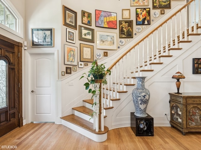 foyer with hardwood / wood-style floors