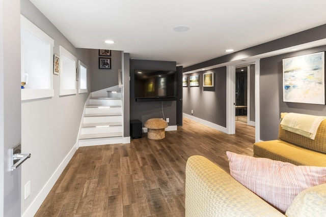 living room with dark hardwood / wood-style floors