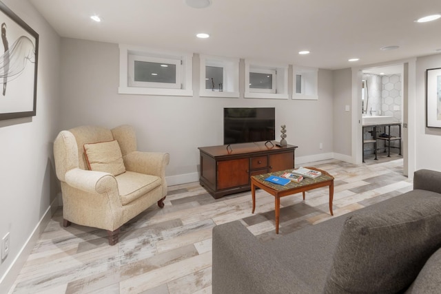 living room with light hardwood / wood-style floors