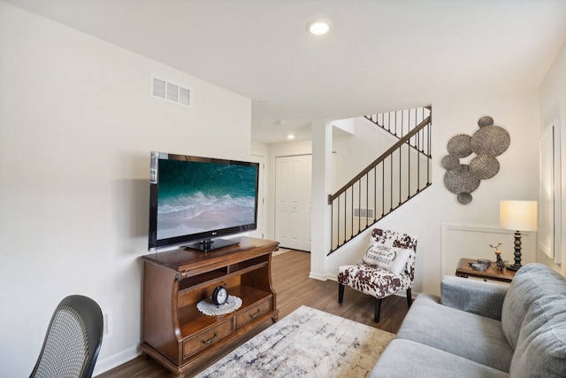 living room with hardwood / wood-style flooring