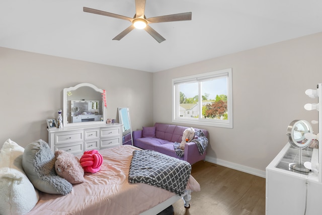 bedroom featuring ceiling fan and light hardwood / wood-style flooring