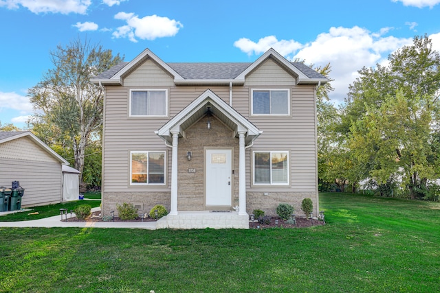 view of front of home with a front yard