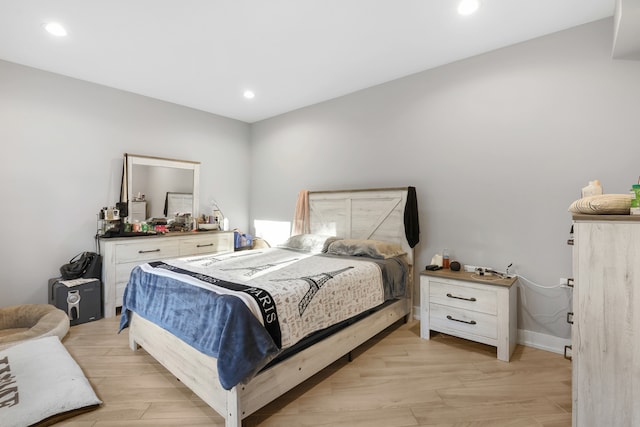 bedroom featuring light hardwood / wood-style flooring