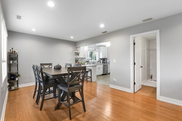 dining area featuring light hardwood / wood-style floors