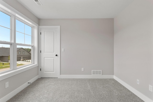 view of carpeted spare room