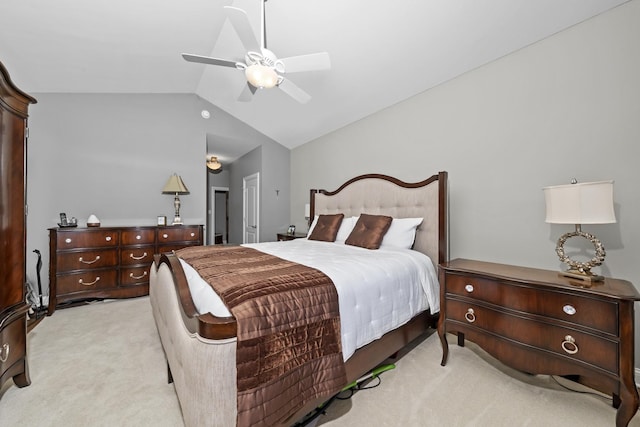 bedroom featuring lofted ceiling, light colored carpet, and ceiling fan