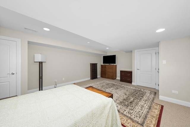 bedroom with light colored carpet