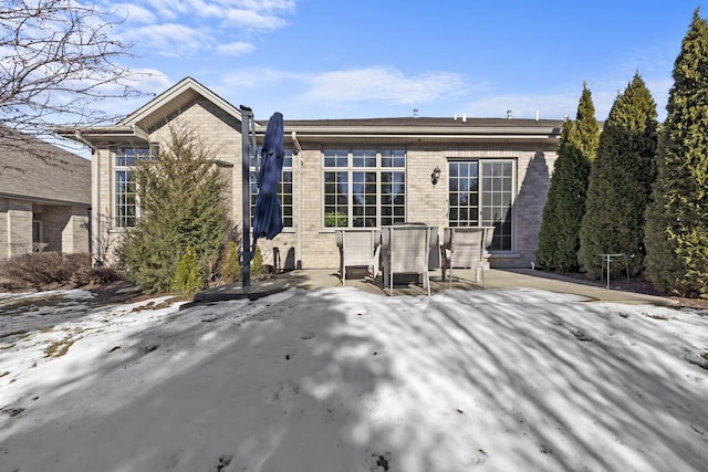 back of property featuring a patio area