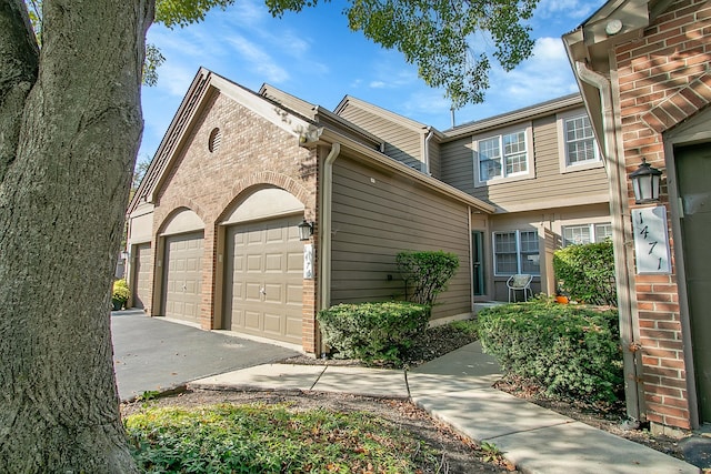 exterior space with a garage