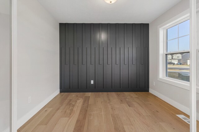 empty room with light wood-type flooring