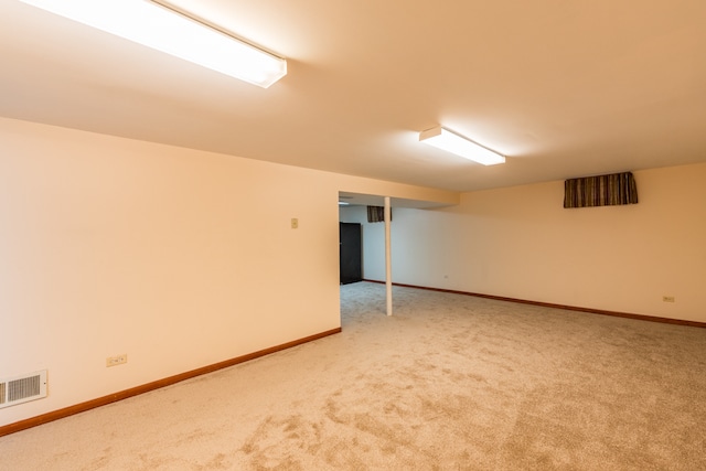 basement with carpet flooring