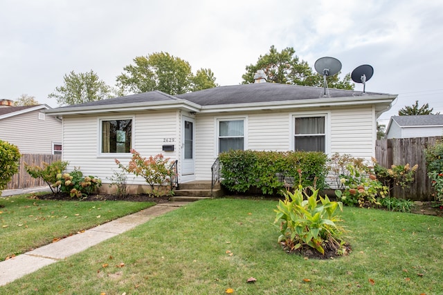 view of front of house with a front lawn