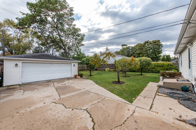 garage with a lawn