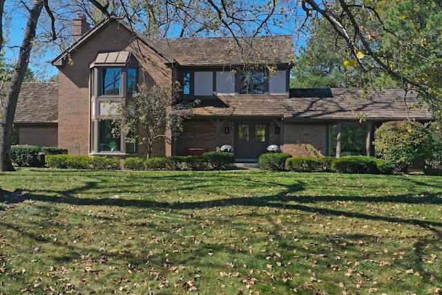 view of front facade featuring a front yard