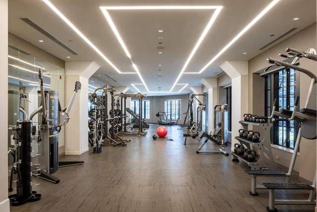 gym featuring hardwood / wood-style flooring