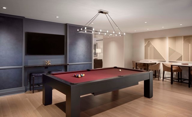 recreation room with light hardwood / wood-style flooring and pool table