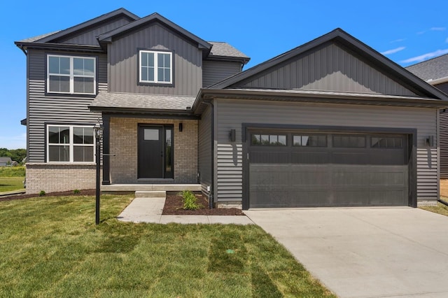 craftsman inspired home with a front yard and a garage