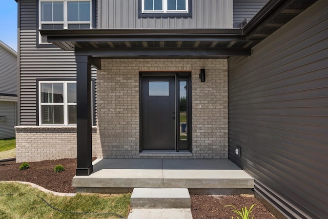 property entrance featuring covered porch