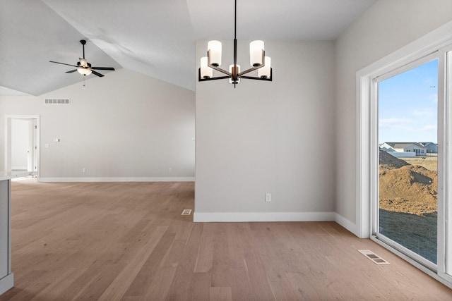 empty room featuring light wood finished floors, visible vents, and ceiling fan with notable chandelier