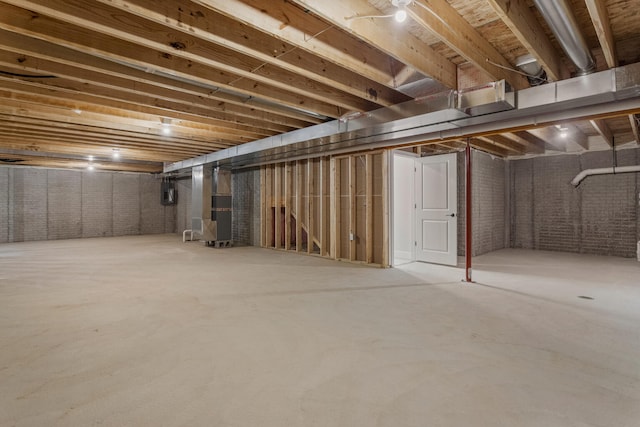 unfinished basement with brick wall