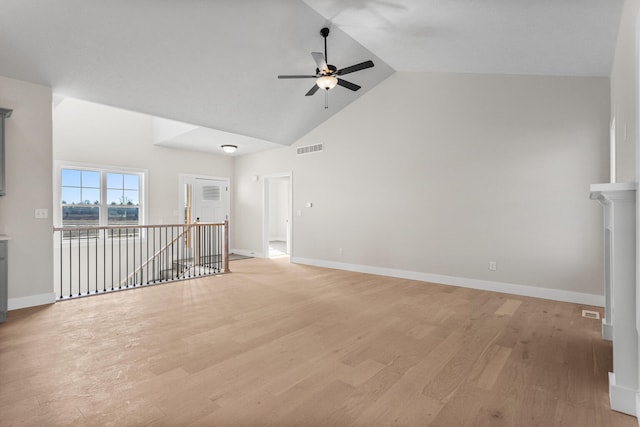unfurnished room with visible vents, baseboards, ceiling fan, and light wood-style flooring