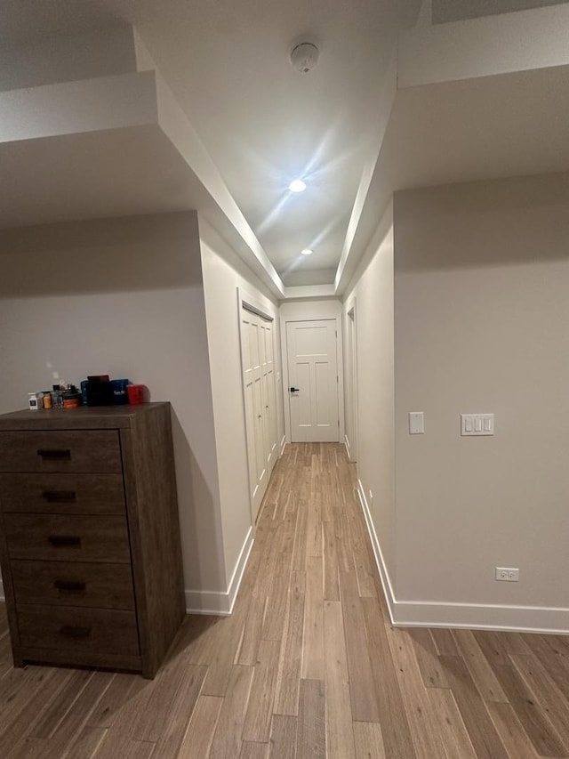 corridor featuring light hardwood / wood-style flooring