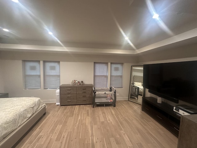 bedroom with light hardwood / wood-style floors