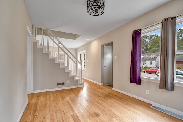 entrance foyer featuring light wood-type flooring