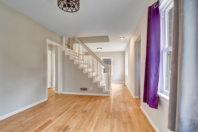 foyer with light hardwood / wood-style flooring