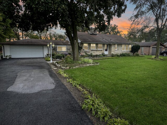 2521 Seminary Ave, Des Plaines, IL 60016 - ranch-style home with asphalt driveway, a yard, stone siding, and a chimney