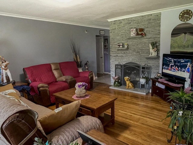 2521 Seminary Ave, Des Plaines, IL 60016 - living area featuring wood finished floors, ornamental molding, and a stone fireplace