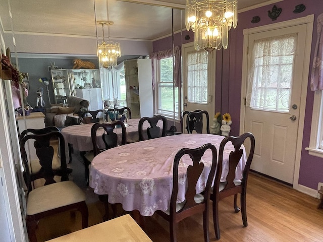 2521 Seminary Ave, Des Plaines, IL 60016 - dining room with a chandelier, ornamental molding, and light wood-style flooring