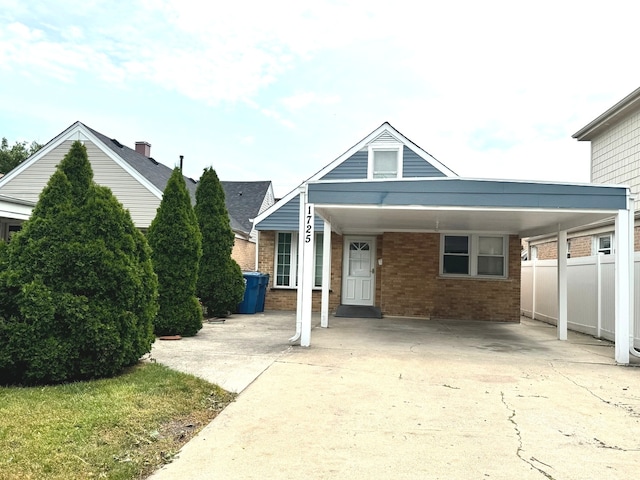 view of front of house with a carport