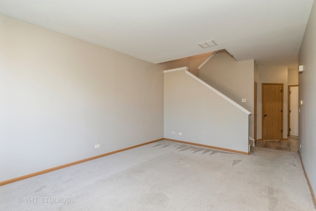 unfurnished room with carpet flooring