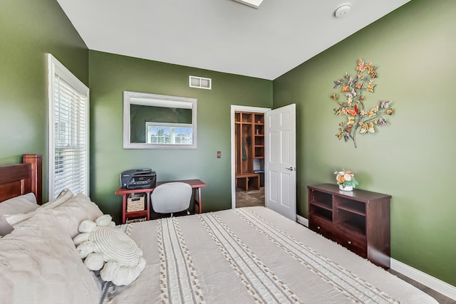 bedroom with a closet and a spacious closet