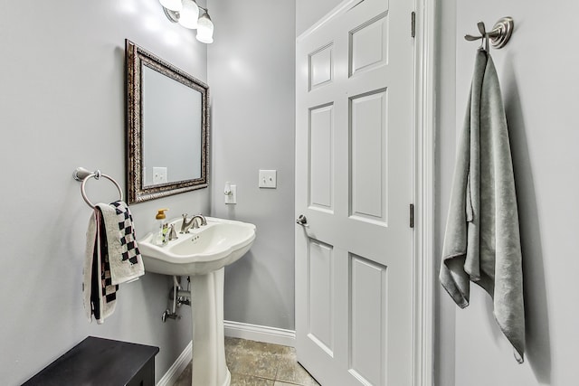 bathroom with tile patterned flooring