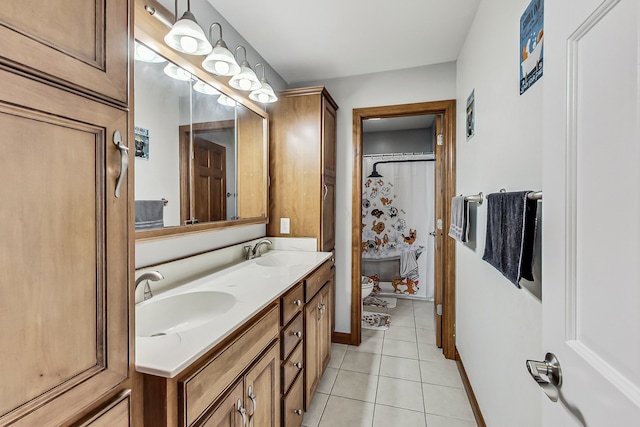 bathroom featuring vanity, toilet, and tile patterned floors