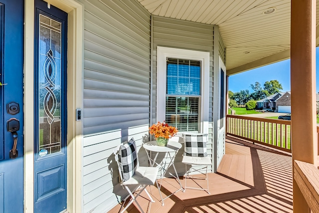 balcony featuring a porch