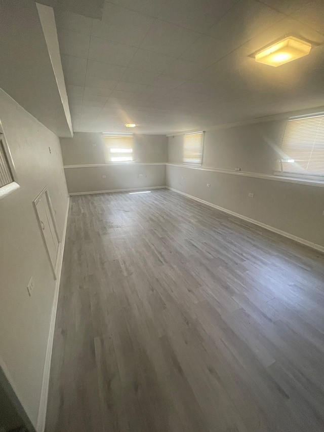 unfurnished room featuring wood-type flooring