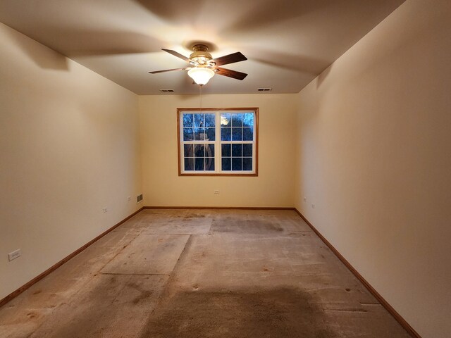 spare room with ceiling fan