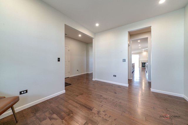 spare room featuring dark hardwood / wood-style floors