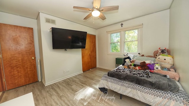 bedroom featuring ceiling fan and light hardwood / wood-style floors