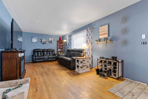 living room with hardwood / wood-style flooring