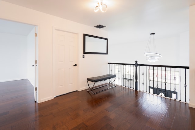 hallway featuring dark wood-type flooring