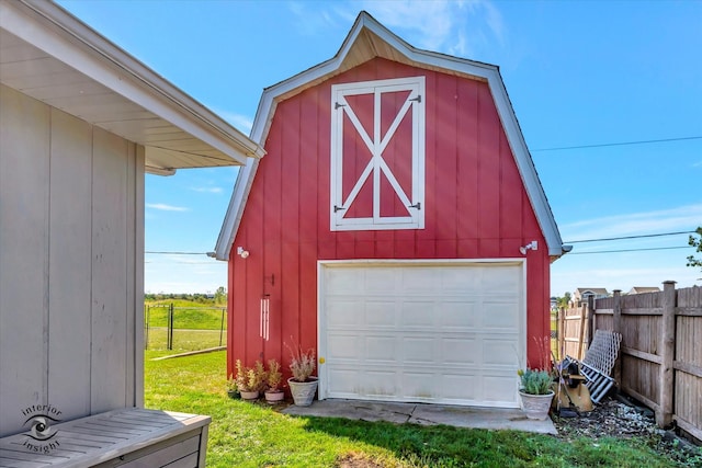 garage with a lawn