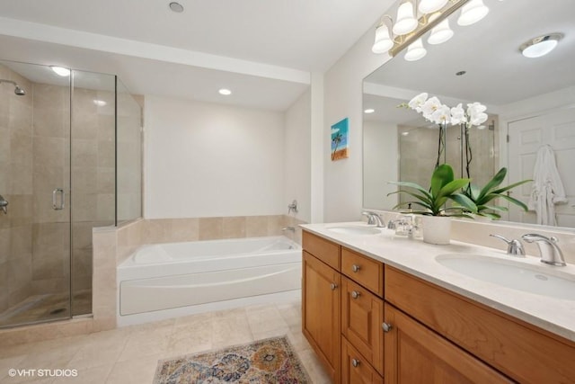 bathroom featuring tile patterned floors, vanity, and plus walk in shower