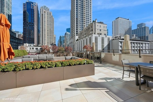 view of home's community with an outdoor living space and a patio