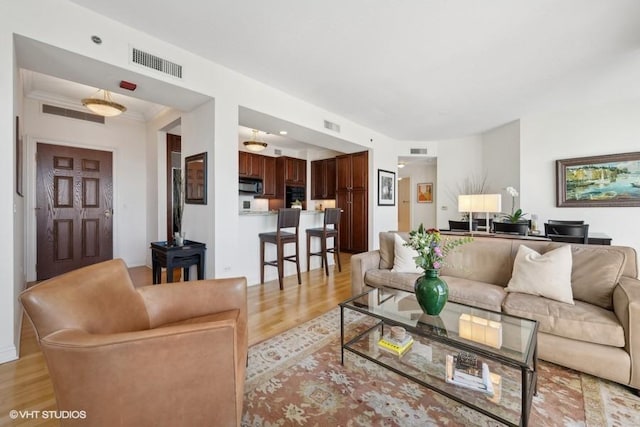 living room with light wood-type flooring